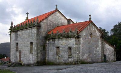 Fototapeta na wymiar Portuguese small church located on top of a mountain, Povoa de L