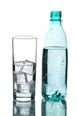 glass of water and bottle isolated