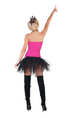 Extravagant blonde in  crown pointing. Rear view