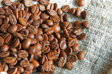 coffee beans over sacking canvas