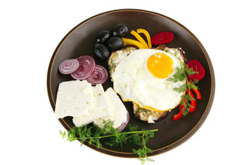 fried egg served on dark plate