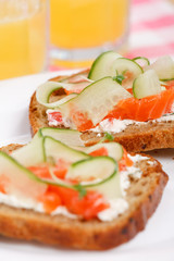 Toasts  with vegetables and fish