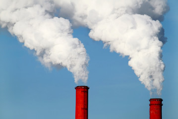 two red pipes and smoke