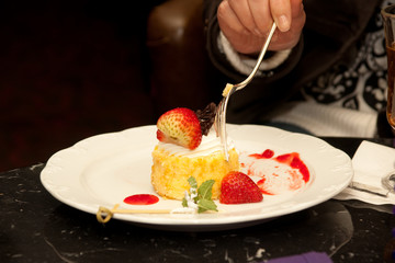 a process of eating cheesecake