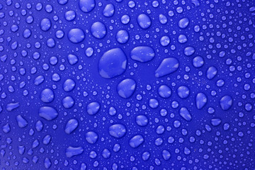 Water drops background with big and small drops