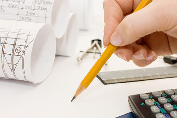 Pencil in a female hand