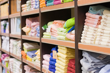 Shelf with towels in a supermarket