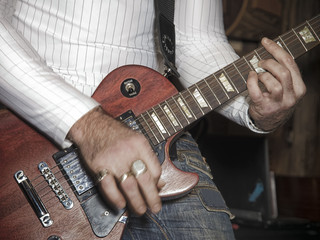 Man playing electrical guitar