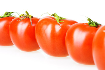Tomatoes isolated on white background.