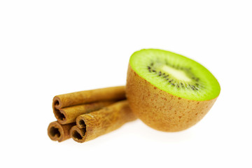 kiwi and cinnamon isolated on white
