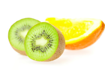Fototapeta na wymiar juicy kiwi and oranges isolated on white