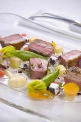 Lamb served with vegetables and sauce