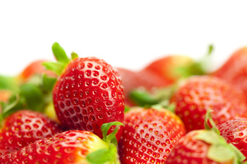 juicy strawberries isolated on white