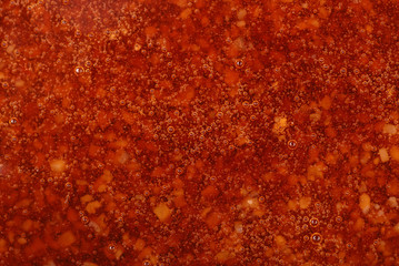 Red jelly background with bubbles