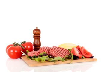 Hamburgers, tomatoes, fries