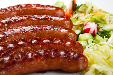 Grilled sausages and vegetables