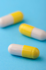 set capsules on blue background