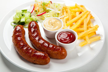 Grilled sausages and vegetables