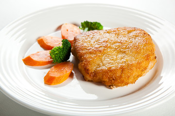 Fried pork chop with vegetables