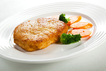 Fried pork chop with vegetables