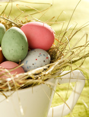 Easter chocolate eggs in the nest.