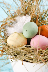 Naklejka na ściany i meble Easter chocolate eggs in the nest.