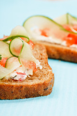 Toasts  with vegetables and fish