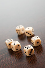 dice on wooden table