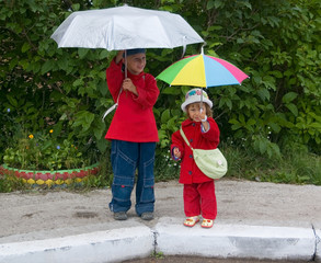 Children with umbrellas