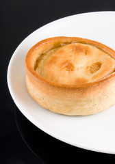 scotch pie on white plate