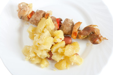 dish with kebab and  potatoes