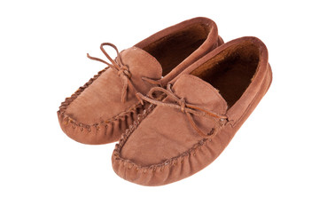 Pair of moccasin slippers isolated on white