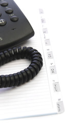 classic phone over a phone book
