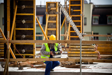 Construction worker working on a construction site. Preparation