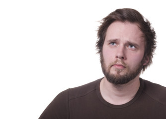 Man thinking or wondering. Isolated on white with copy-space.