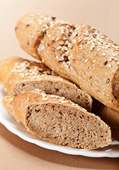 Fototapeta premium Small bread with slice
