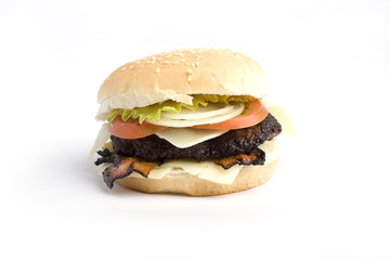 Beef burger with onion rings, tomato and lettuce