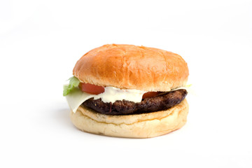 Beef burger with cream, tomato and lettuce