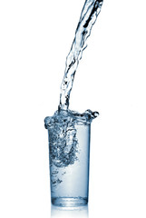 water splash in glass isolated on white