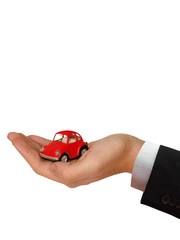 The Hand of the Businessman with the lovely red Car