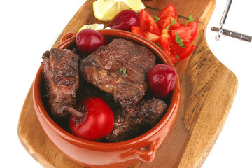 beef meat in pot with vegetables