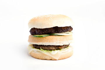 Two slices of ground beef, cream cheese and dressing