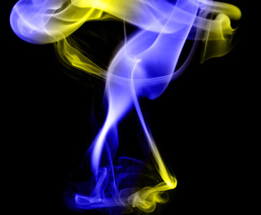 Color smoke on black background