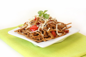 Fried noodles with vegetables and basil