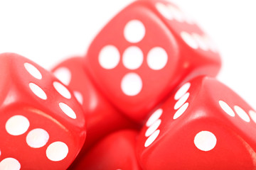 Red and white dice on a white background