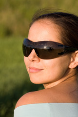 Young woman in sunglasses