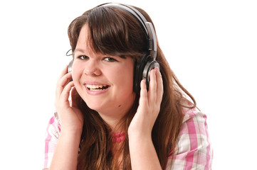 Fototapeta premium Teenager Mädchen hört Musik mit Kopfhörer