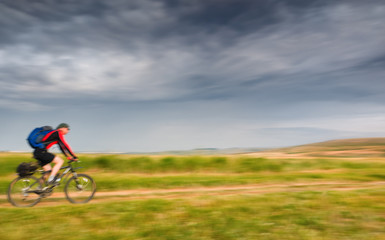 Fototapeta na wymiar biker in motion