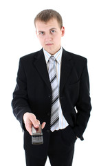 Young businessman in black suit with phone