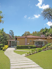 Fototapeta premium beautiful countryhouse view under beautiful blue sky
